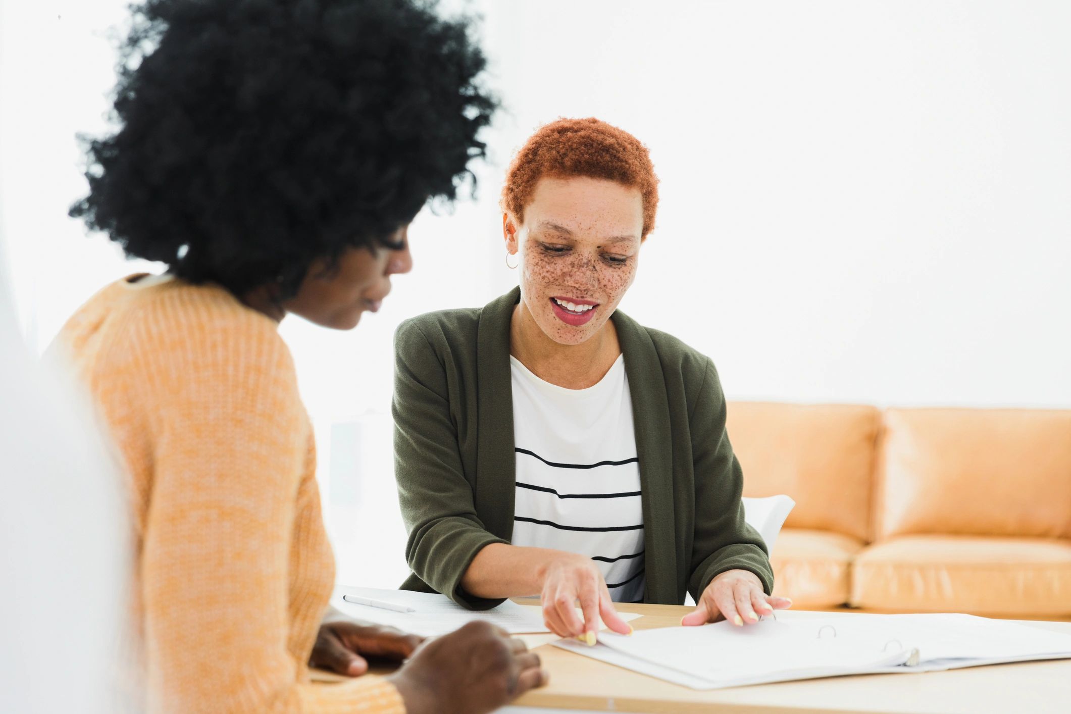 Attorney reviewing documents with a client